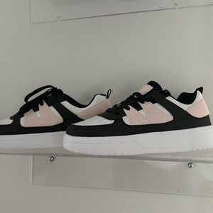 Cute sneakers! Have never been worn before. Good quality